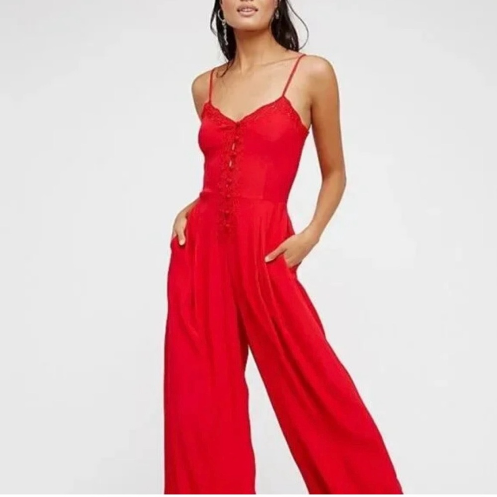Free People wide leg Jumpsuit with lace details and button down front